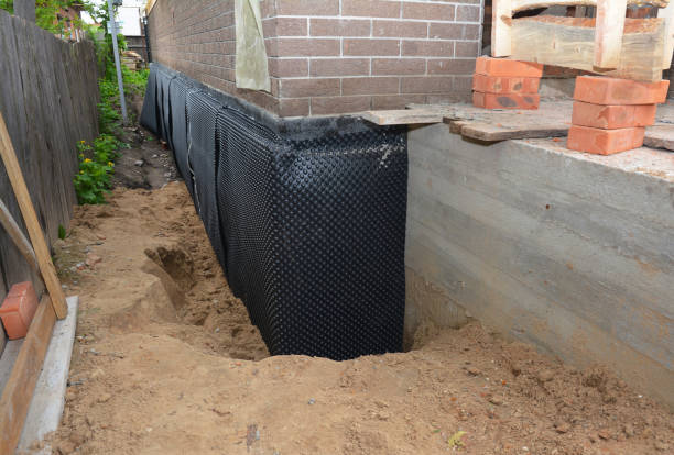 Happy homeowners after waterproofing job in Cedar Bluff